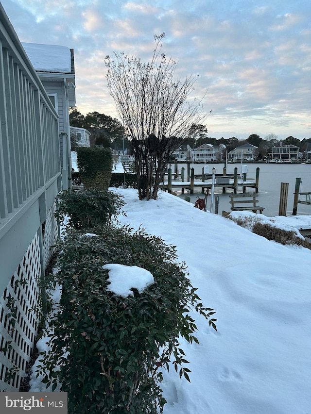 view of yard covered in snow