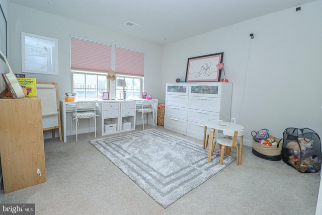 interior space featuring light carpet