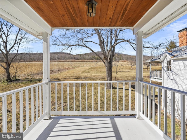 balcony featuring a porch