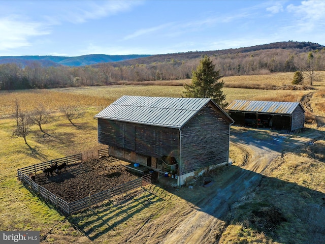 bird's eye view featuring a rural view and a mountain view