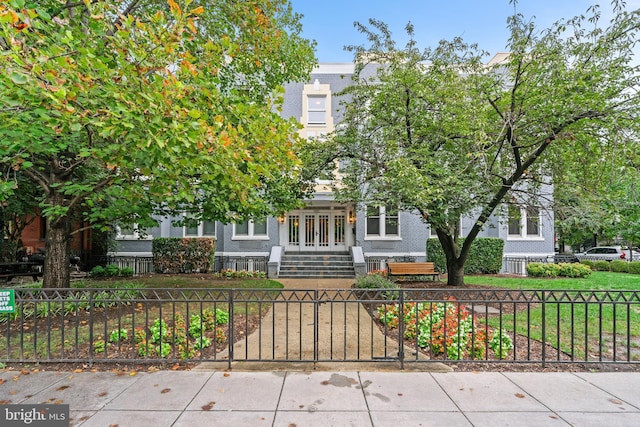 view of property hidden behind natural elements