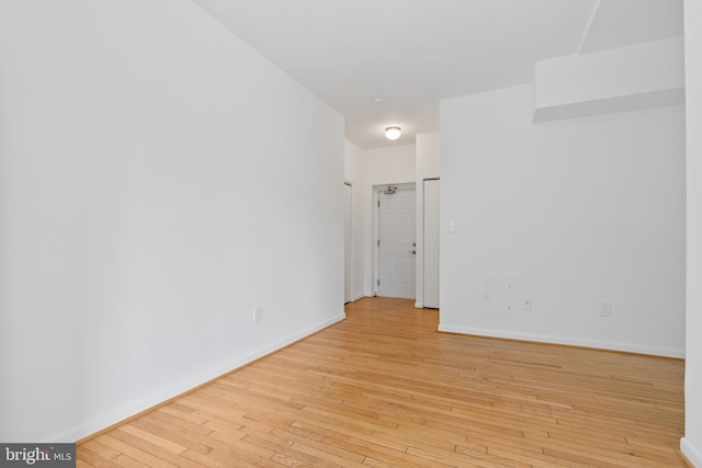 unfurnished room featuring light hardwood / wood-style flooring