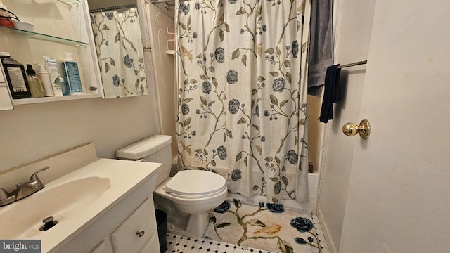 full bathroom with toilet, vanity, and shower / tub combo