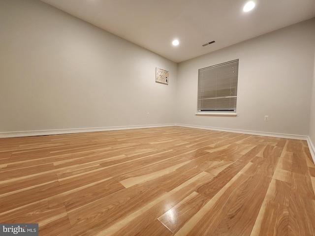 unfurnished room featuring light wood-type flooring