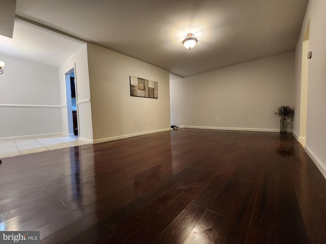 unfurnished room featuring hardwood / wood-style floors