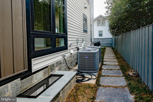 view of home's exterior with central AC unit