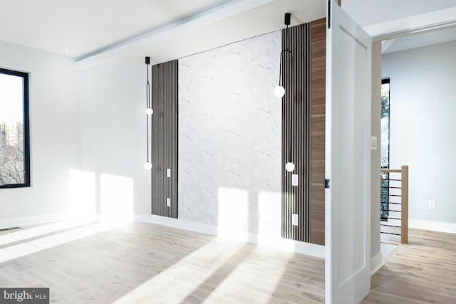 interior space with plenty of natural light and light wood-type flooring