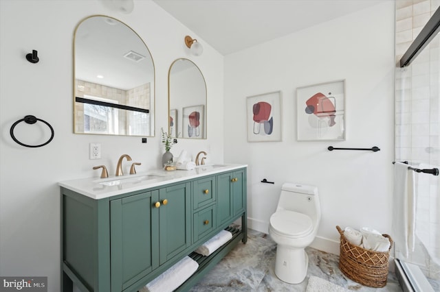 bathroom with a baseboard radiator, an enclosed shower, vanity, and toilet