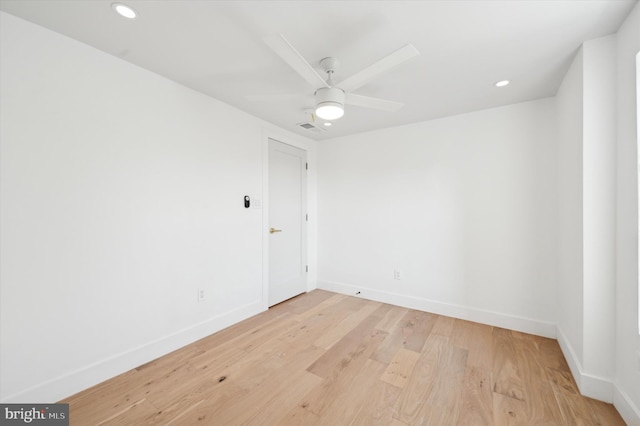 unfurnished room featuring light hardwood / wood-style floors and ceiling fan