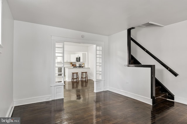 interior space with dark wood-type flooring