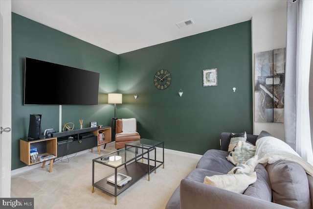 living room with light colored carpet