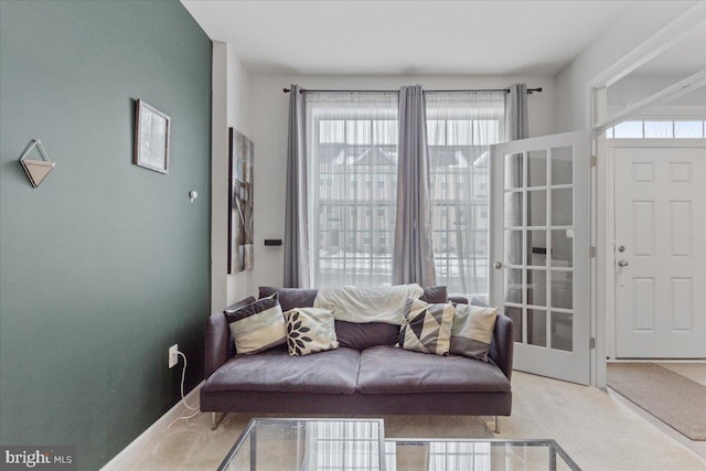 living room with light carpet