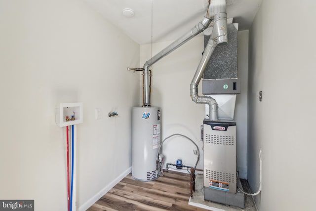 utility room with gas water heater