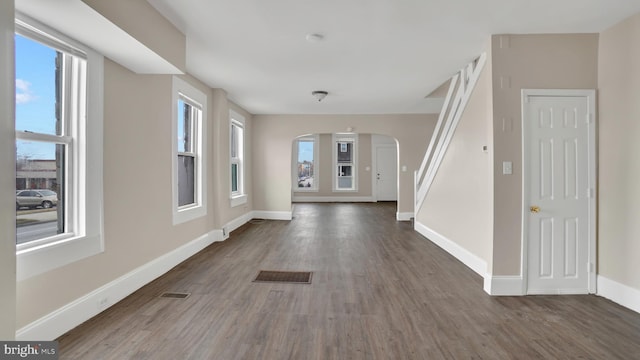 interior space with dark hardwood / wood-style flooring