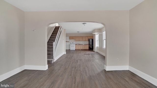 interior space with dark hardwood / wood-style floors