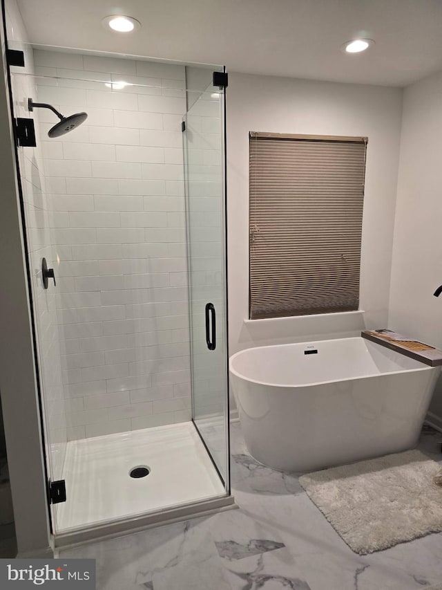 bathroom with independent shower and bath