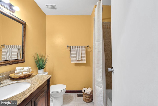 full bathroom with vanity, shower / bath combination with curtain, tile patterned floors, and toilet