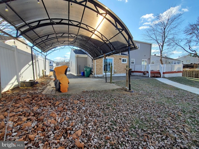 view of parking / parking lot with a carport