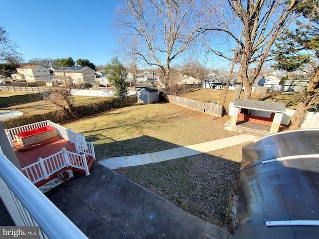 view of yard with a storage shed