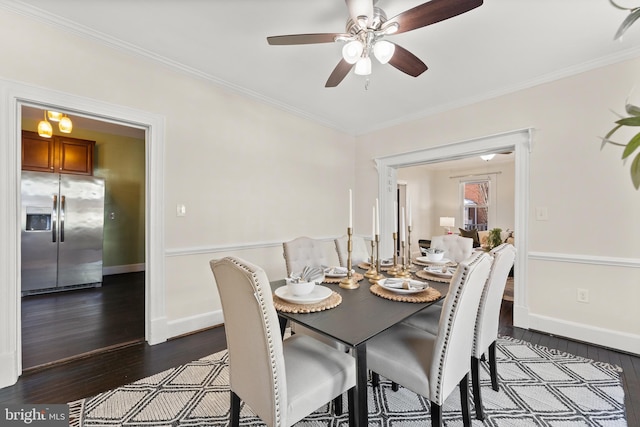 dining area with dark wood-type flooring, ceiling fan, and crown molding