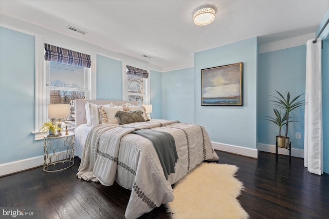 bedroom featuring dark wood-type flooring