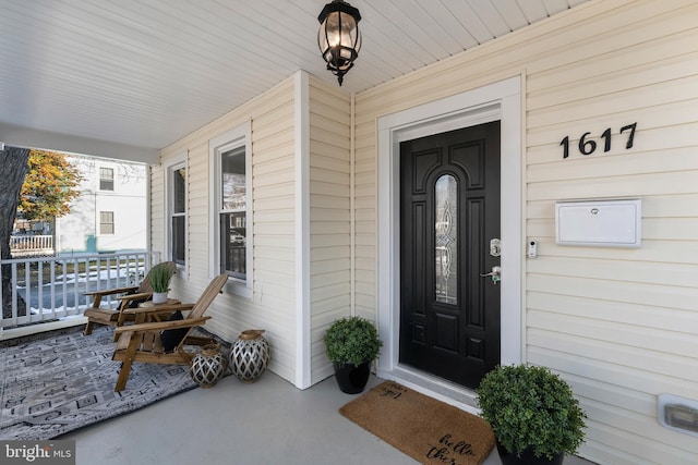 entrance to property with covered porch