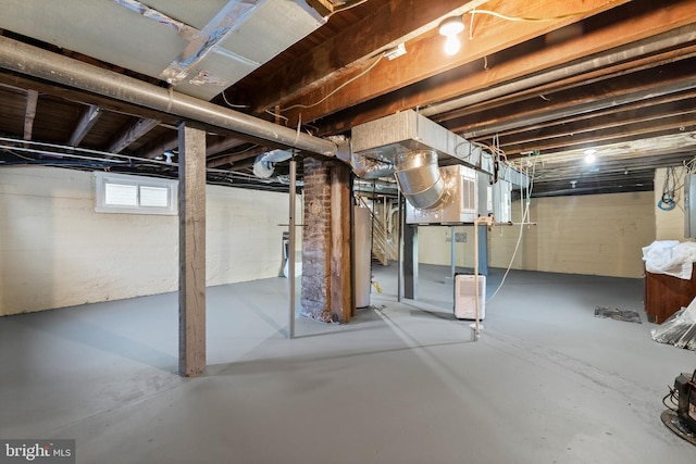 basement featuring gas water heater