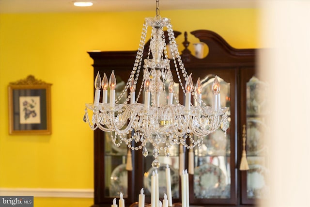 details with an inviting chandelier