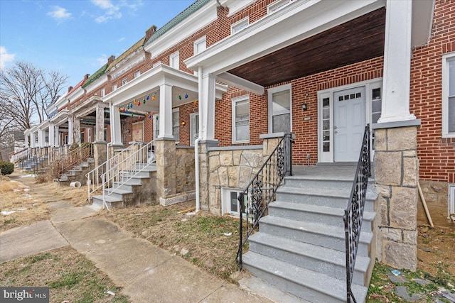 doorway to property with covered porch