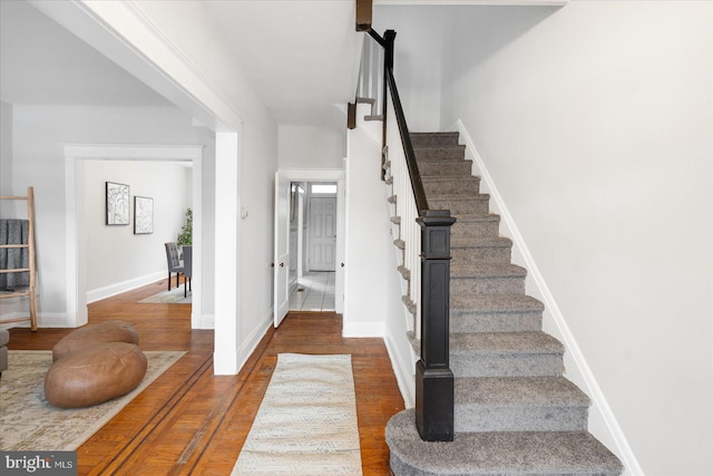 foyer featuring dark hardwood / wood-style floors