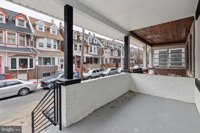 balcony featuring covered porch