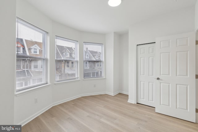 unfurnished bedroom featuring light hardwood / wood-style floors