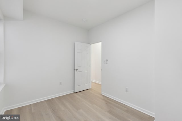 empty room with light wood-type flooring