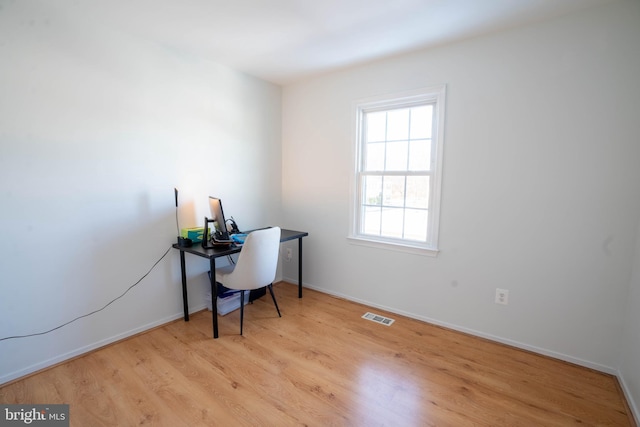 office area featuring light hardwood / wood-style floors