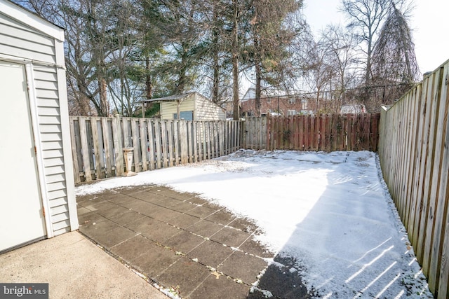 view of yard covered in snow