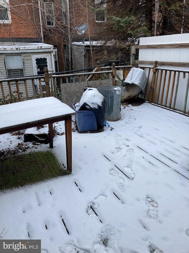 view of snow covered deck