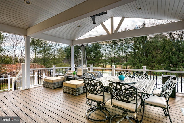 wooden deck featuring a gazebo