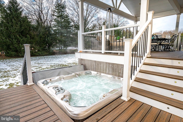 view of snow covered deck