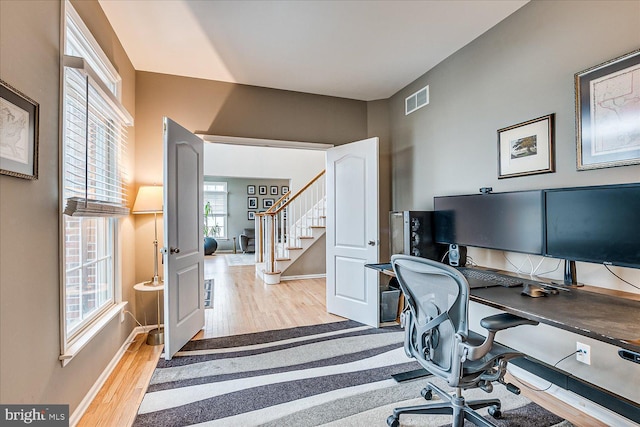 office area with light wood-type flooring