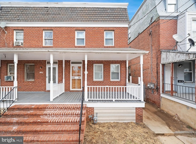 multi unit property featuring covered porch