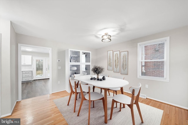 dining area featuring light hardwood / wood-style flooring