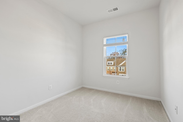 view of carpeted spare room