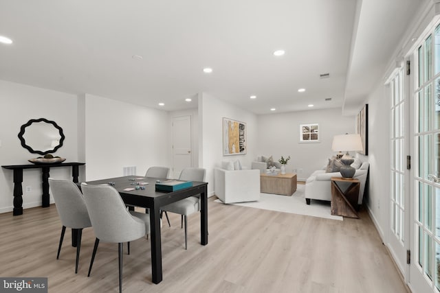 dining room featuring light hardwood / wood-style floors