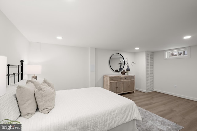 bedroom featuring hardwood / wood-style flooring