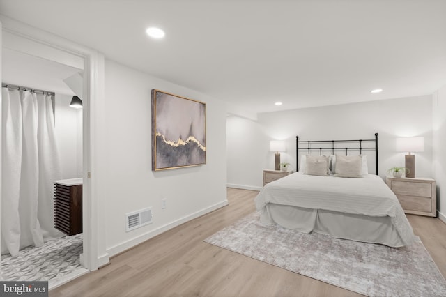 bedroom featuring light hardwood / wood-style flooring