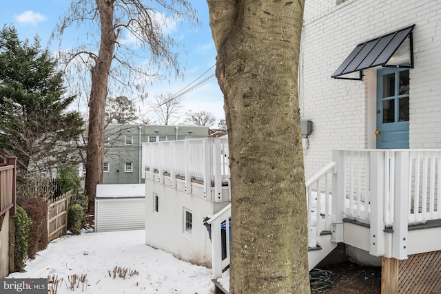 view of snow covered property