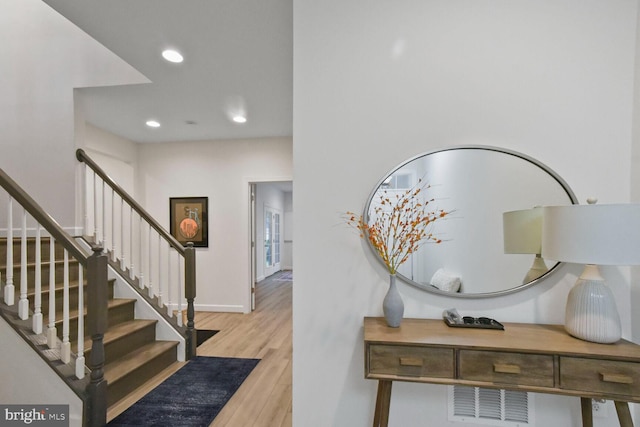 foyer with light wood-type flooring