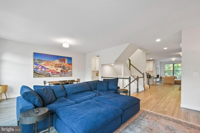 living room with light hardwood / wood-style flooring