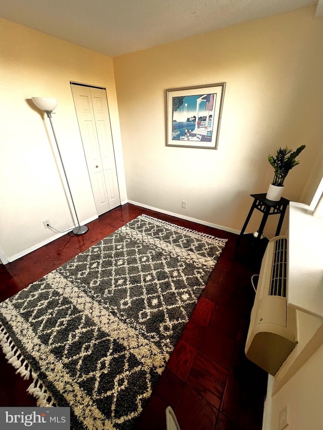 bedroom featuring dark hardwood / wood-style floors