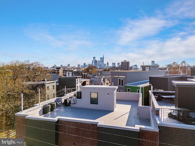 exterior space with central AC unit and an outdoor living space